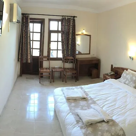 克丽姆酒店及公寓